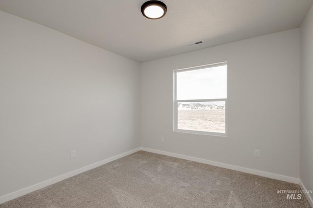 8196 E Red Horse St, Nampa, ID 83687 - unfurnished room featuring visible vents, light colored carpet, and baseboards