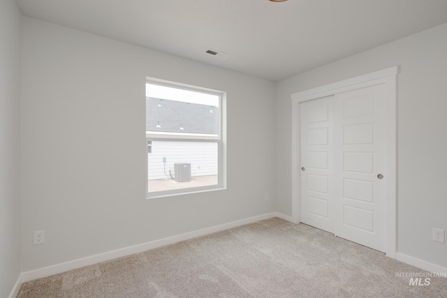 8196 E Red Horse St, Nampa, ID 83687 - unfurnished bedroom with baseboards, visible vents, a closet, and carpet flooring