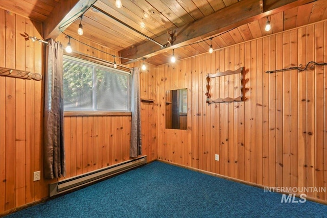 14525 Woosley, Nampa, ID 83651 - spare room with a baseboard radiator, wooden ceiling with exposed beams, carpet flooring, and wooden walls