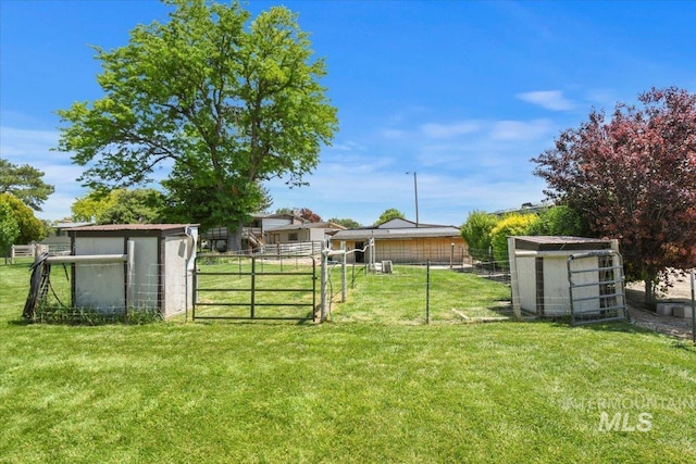 14525 Woosley, Nampa, ID 83651 - view of yard with an outbuilding and a gate