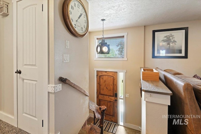14525 Woosley, Nampa, ID 83651 - foyer featuring a textured ceiling and baseboards