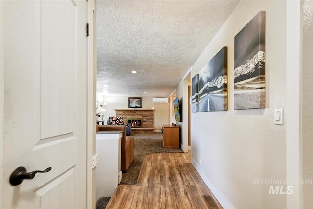 14525 Woosley, Nampa, ID 83651 - corridor with a textured ceiling, wood finished floors, and baseboards