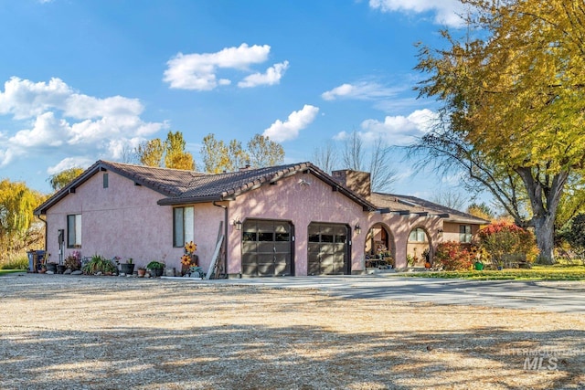 view of front of house with a garage