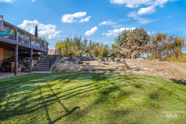 view of yard featuring a deck