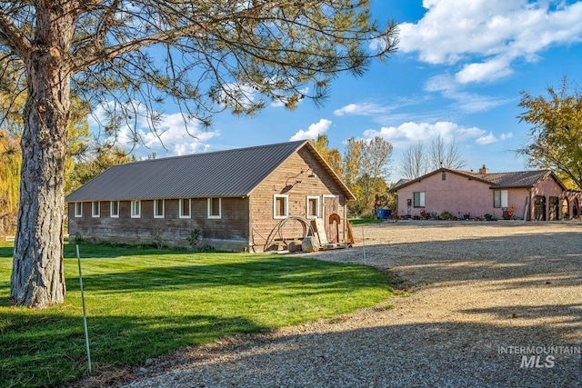 view of front of home with a front lawn