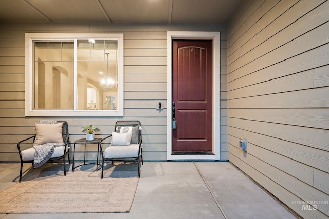 entrance to property with covered porch