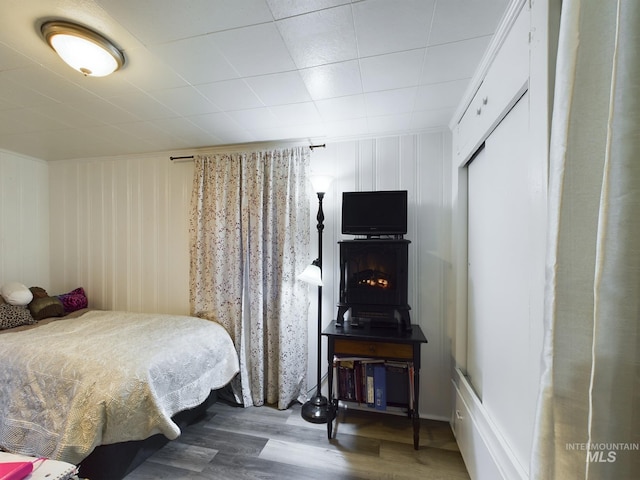 bedroom with hardwood / wood-style floors