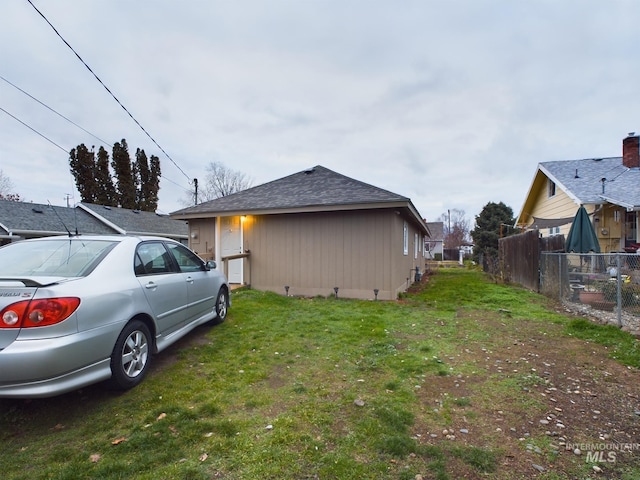 view of property exterior with a yard