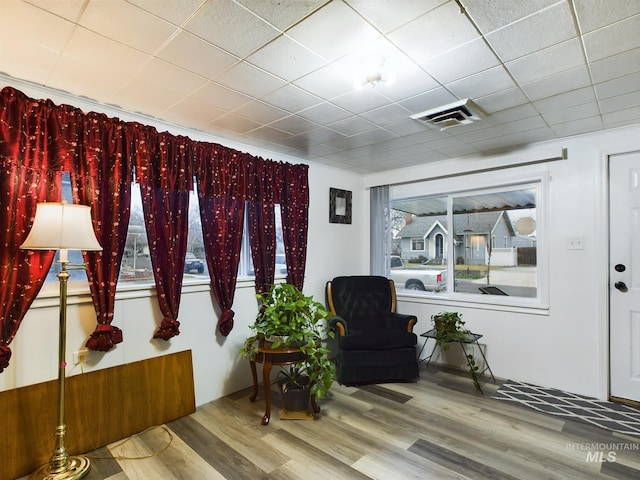 sitting room with hardwood / wood-style floors