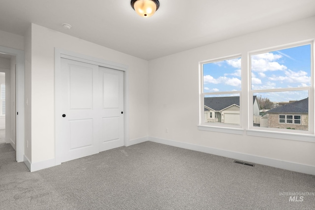 664 E Lockhart St, Meridian, ID 83646 - unfurnished bedroom featuring baseboards, a closet, visible vents, and carpet