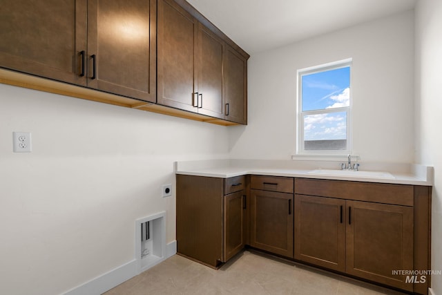 664 E Lockhart St, Meridian, ID 83646 - laundry room featuring visible vents, hookup for an electric dryer, a sink, baseboards, and cabinet space