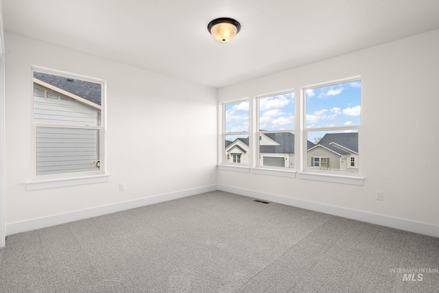 664 E Lockhart St, Meridian, ID 83646 - empty room with visible vents, baseboards, and carpet floors