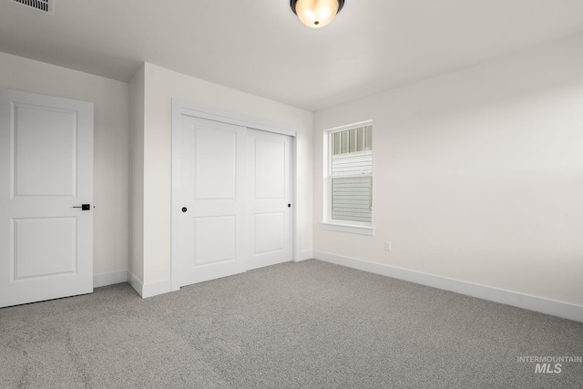 664 E Lockhart St, Meridian, ID 83646 - unfurnished bedroom featuring visible vents, baseboards, a closet, and carpet flooring