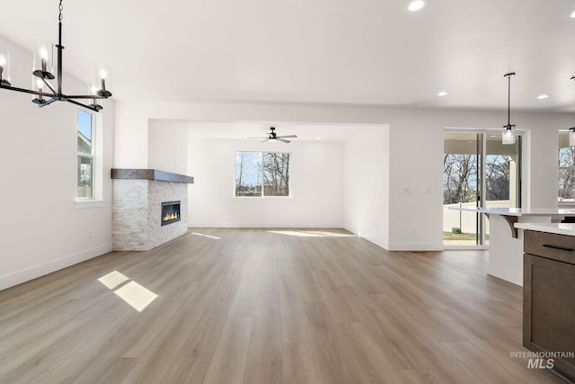 664 E Lockhart St, Meridian, ID 83646 - unfurnished living room with a wealth of natural light, light wood finished floors, and recessed lighting
