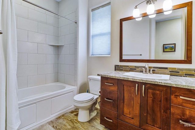 full bath featuring toilet, vanity, and shower / tub combo