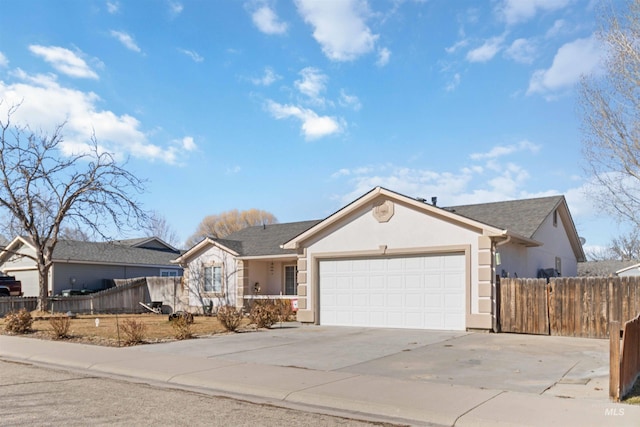 ranch-style house featuring a garage, concrete driveway, fence, and stucco siding