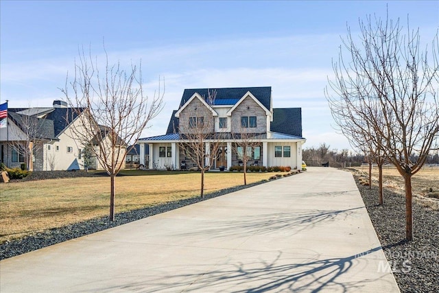 view of front of home with a front yard