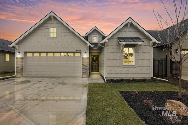 view of front of house with a lawn and a garage