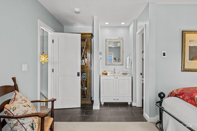 2226 Bonne Vie Condo Dr, Sun Valley, ID 83353 - bathroom featuring vanity, tile patterned flooring, baseboards, and recessed lighting