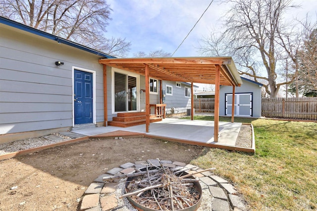 exterior space with a shed, entry steps, an outdoor structure, and fence