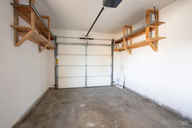 garage featuring baseboards