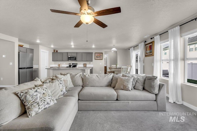 1266 S Wiston Ave, Kuna, ID 83634 - living area featuring ceiling fan, baseboards, and recessed lighting