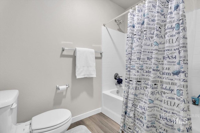 1266 S Wiston Ave, Kuna, ID 83634 - bathroom with toilet, wood finished floors, shower / bath combo, and baseboards