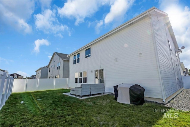 1266 S Wiston Ave, Kuna, ID 83634 - rear view of house with an outdoor hangout area