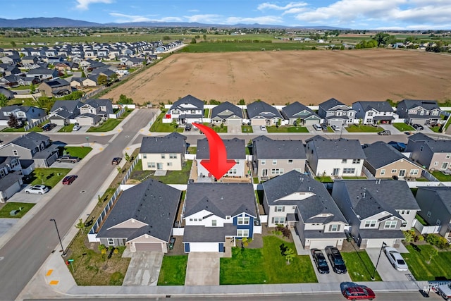 1266 S Wiston Ave, Kuna, ID 83634 - aerial view of property's location featuring nearby suburban area and a mountain backdrop