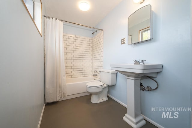 602 Nevada Ave, Homedale, ID 83628 - bathroom with shower / tub combo and finished concrete floors