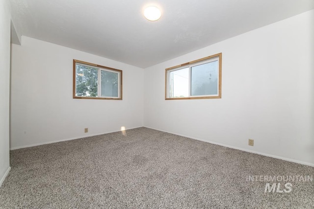 602 Nevada Ave, Homedale, ID 83628 - empty room featuring carpet floors and baseboards