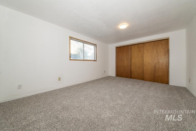 602 Nevada Ave, Homedale, ID 83628 - unfurnished bedroom featuring carpet flooring and a closet