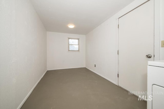 602 Nevada Ave, Homedale, ID 83628 - unfurnished bedroom featuring concrete flooring and washer / dryer