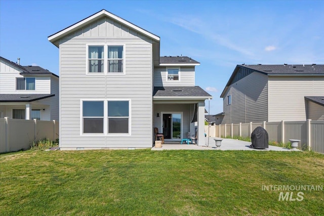 8450 S Bogus Ridge Ave, Boise, ID 83716 - rear view of property with a patio, board and batten siding, and roof with shingles