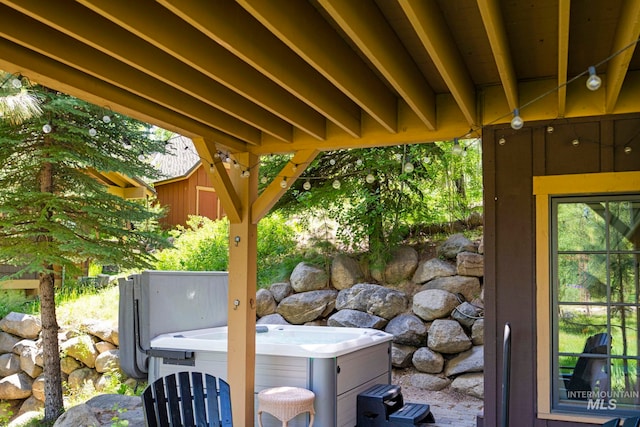 23 Golden Bar Ct, Donnelly, ID 83615 - view of patio / terrace featuring a hot tub