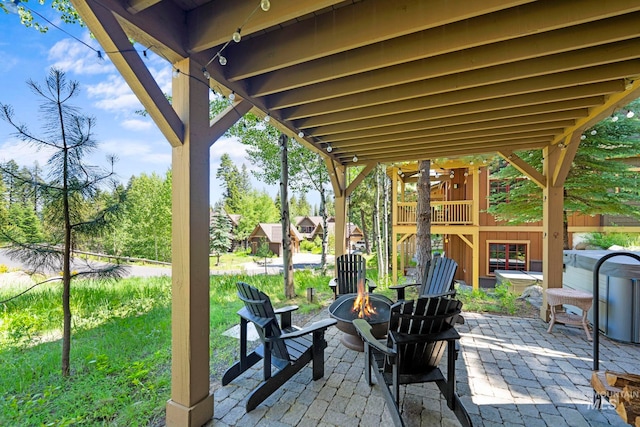 23 Golden Bar Ct, Donnelly, ID 83615 - view of patio with an outdoor fire pit
