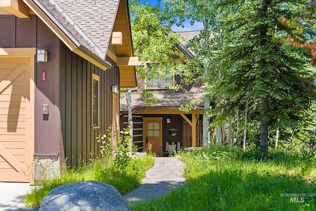 23 Golden Bar Ct, Donnelly, ID 83615 - property entrance featuring board and batten siding and a shingled roof