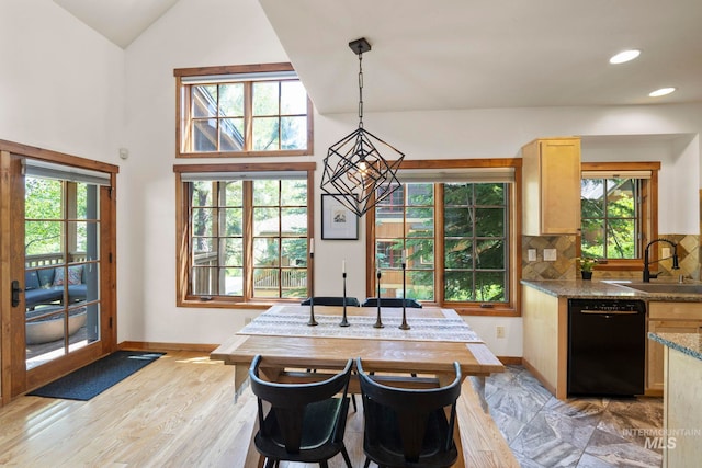 23 Golden Bar Ct, Donnelly, ID 83615 - dining room with light wood-type flooring, recessed lighting, and lofted ceiling