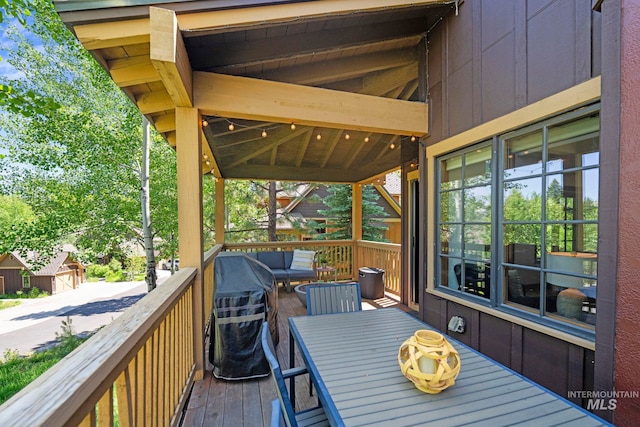 23 Golden Bar Ct, Donnelly, ID 83615 - wooden terrace with outdoor dining area and grilling area