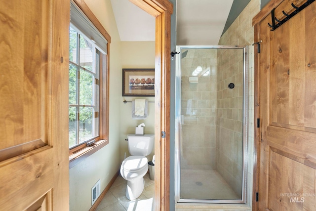 23 Golden Bar Ct, Donnelly, ID 83615 - full bathroom featuring a stall shower, tile patterned flooring, and plenty of natural light