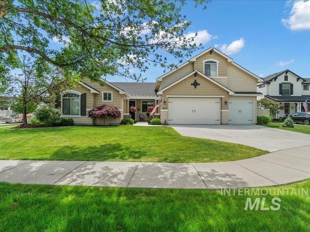 4275 W Cardon St, Eagle, ID 83616 - craftsman house featuring driveway, a front yard, and a garage