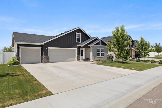 2188 Navigator St, Middleton, ID 83644 - craftsman-style house with board and batten siding, a garage, concrete driveway, stone siding, and a shingled roof