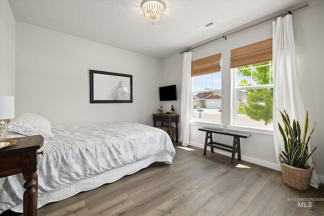 2188 Navigator St, Middleton, ID 83644 - bedroom with wood finished floors and baseboards