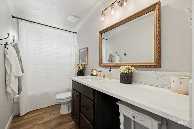 2188 Navigator St, Middleton, ID 83644 - full bath with wood finished floors, vanity, and shower / tub combo with curtain