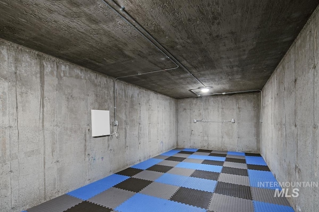 finished below grade area with tile patterned floors