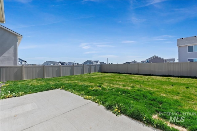 view of yard with a patio area