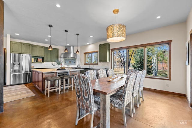 306 Otter Pond Ln, Mccall, ID 83638 - dining space featuring baseboards, recessed lighting, finished concrete flooring, and a healthy amount of sunlight