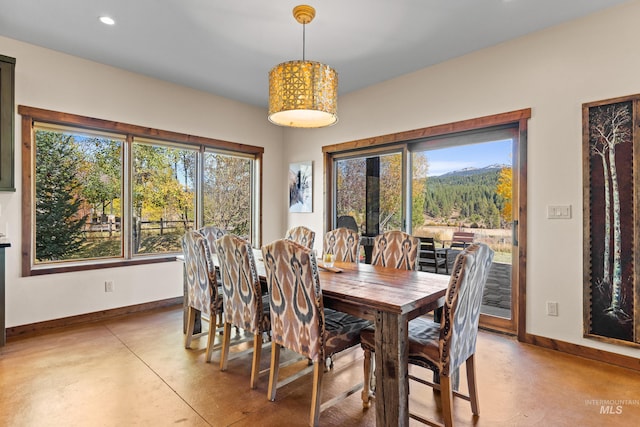 306 Otter Pond Ln, Mccall, ID 83638 - dining area with recessed lighting, baseboards, and concrete floors