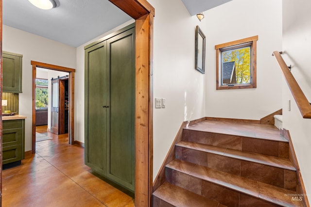 306 Otter Pond Ln, Mccall, ID 83638 - stairs featuring baseboards and finished concrete floors