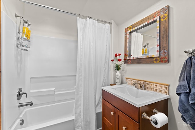 306 Otter Pond Ln, Mccall, ID 83638 - bathroom featuring vanity, tasteful backsplash, and shower / tub combo with curtain